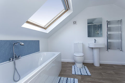 A new bathroom installed in a mansard loft conversion