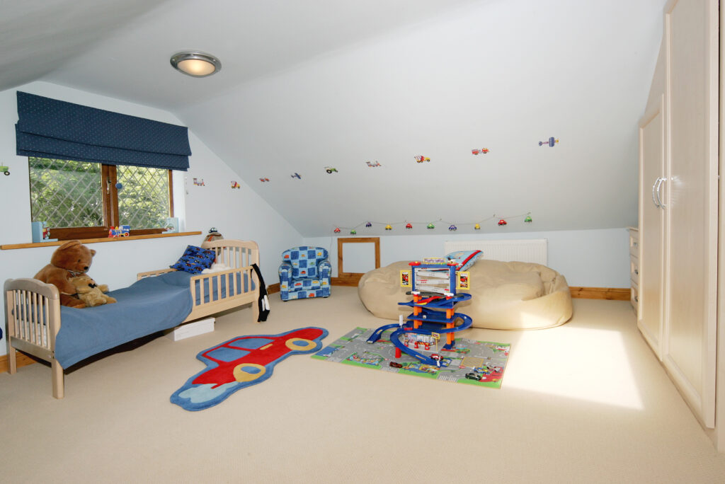 A children's playroom created in a new loft space