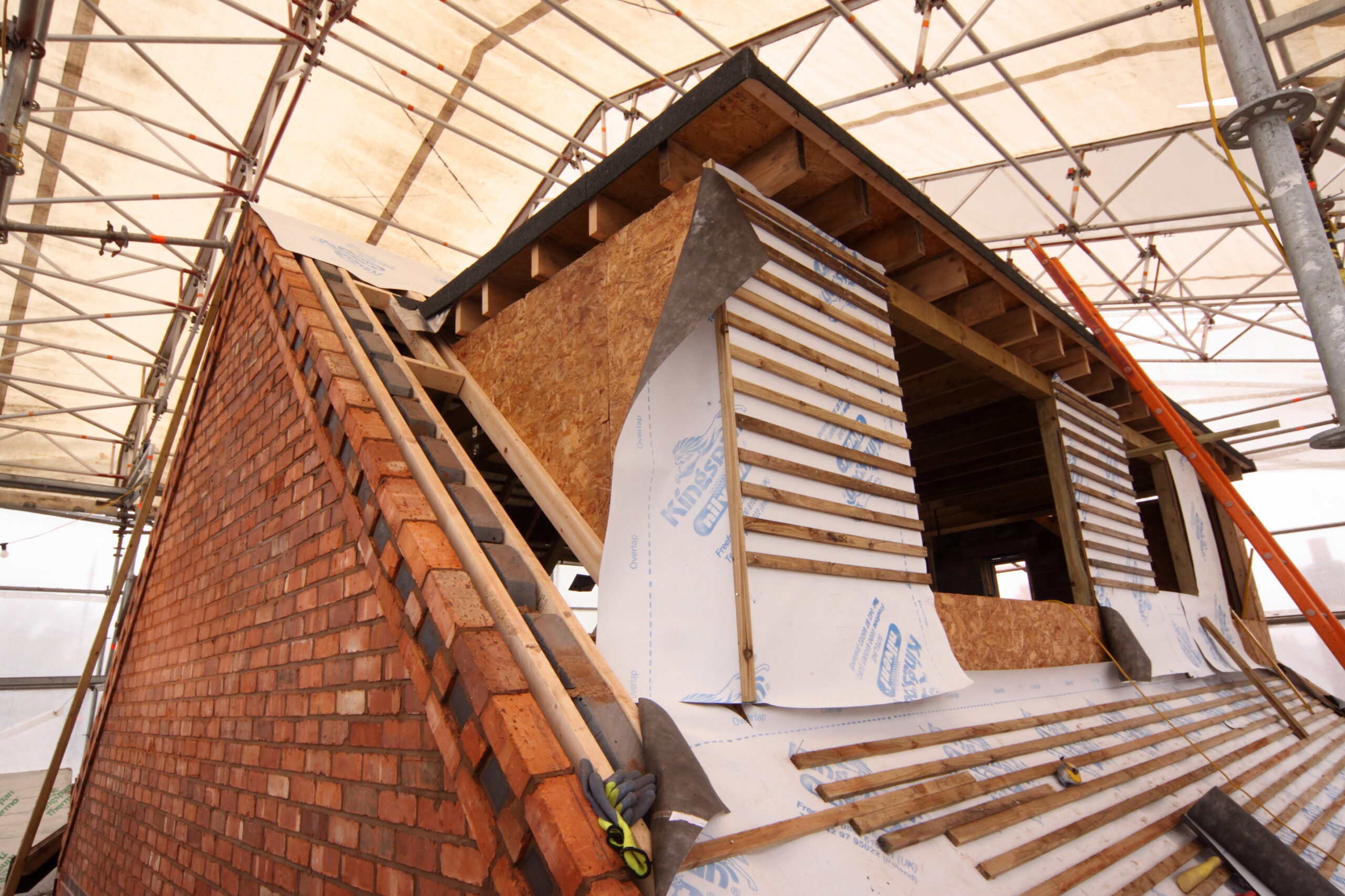 Canopy cover over loft conversion during the winter