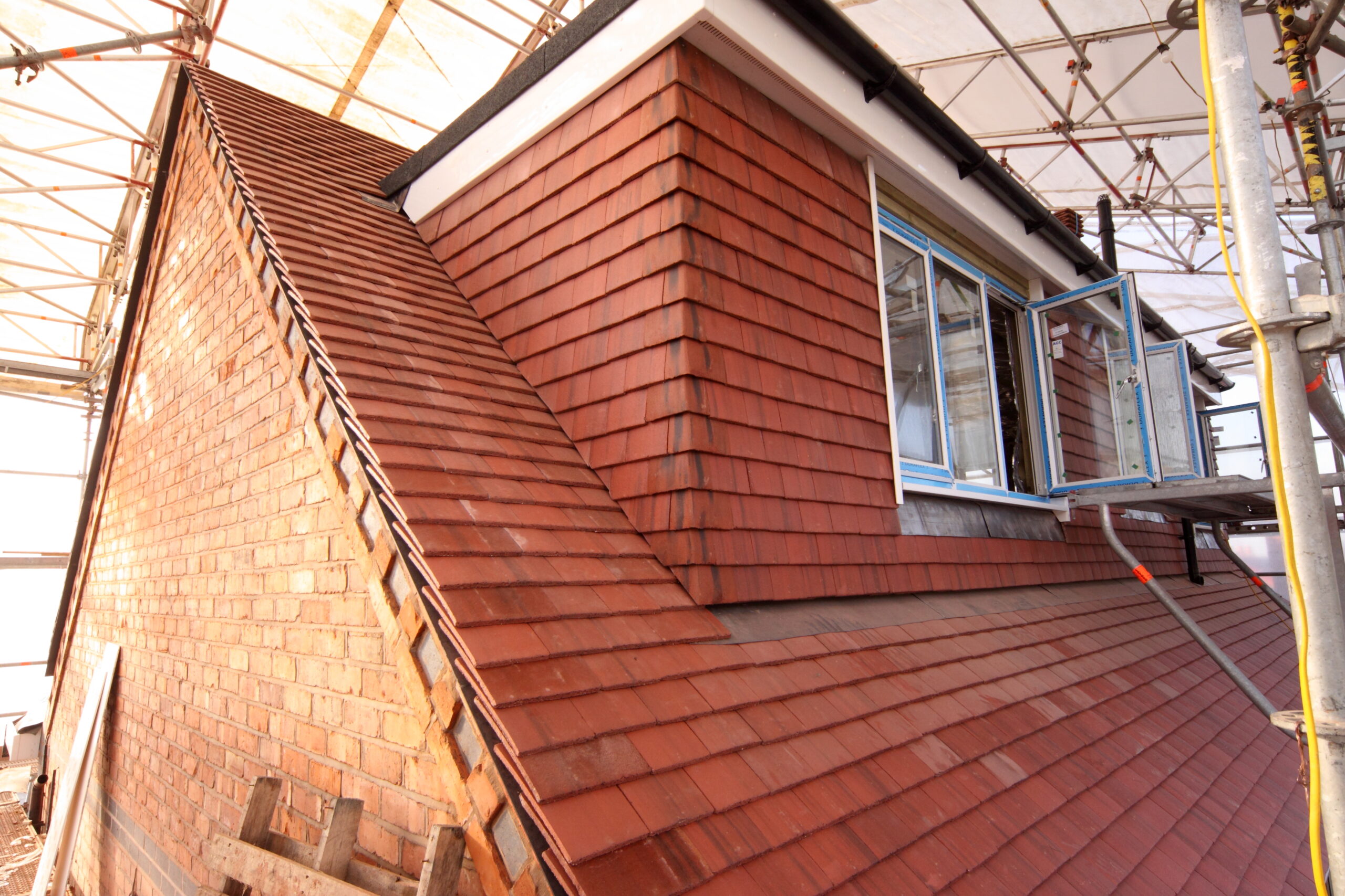 window installation on a winter loft conversion