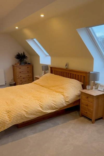 Rear dormer loft conversion master bedroom suite with two VELUX windows