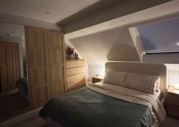 A newly finished bedroom with VELUX window