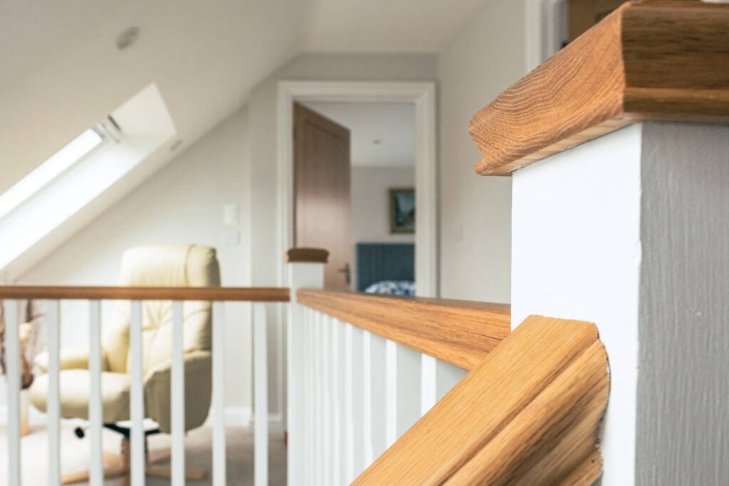Newly,Installed,Wooden,Stair,Bannisters,Leading,The Loft Conversion